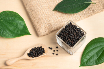 Fresh black cambodian pepper corn in bowl, cooking preparation