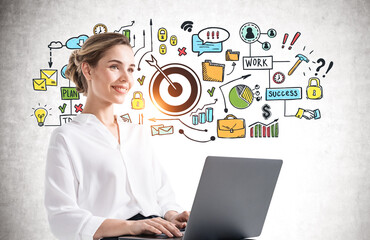 Smiling young woman with laptop and business goal