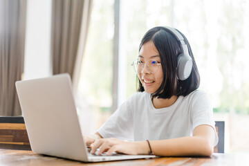 Asian pre teens girl study online learning in class.online education. video call with zoom , Happy...