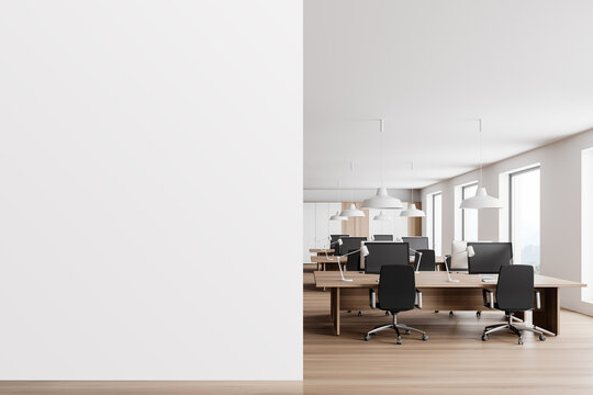 White and wooden open space office interior with mock up wall