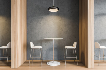 Beige bar chairs with table and light wooden partition on wooden floor