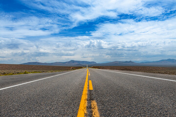View of the US route 50 (known as the Loneliest Road in America) in the State of Nevada, USA....