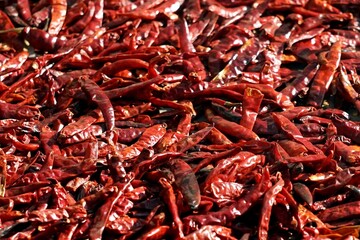 Preparing a chilli sun exposure for green papaya salad.