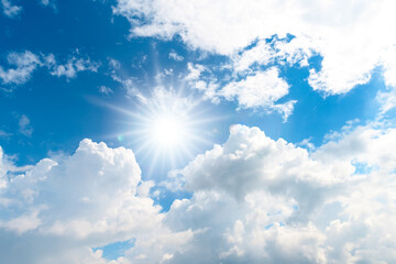 Naklejka na ściany i meble Sunlight and clouds with blue sky background