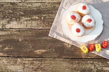 Donuts with nice and creative symbols sevivon, spining  hanukia tasty sweet bakery for Hanukkah day, Jewish traditional holiday  Hanukkah card, Hag Ha Hanukka big miracle was here
