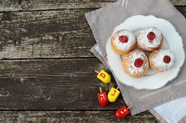 Donuts with nice and creative symbols sevivon, spining  hanukia tasty sweet bakery for Hanukkah day, Jewish traditional holiday  Hanukkah card, Hag Ha Hanukka big miracle was here

