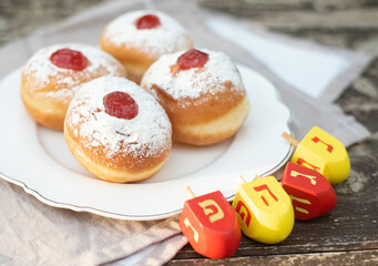 Donuts with nice and creative symbols sevivon, spining  hanukia tasty sweet bakery for Hanukkah day, Jewish traditional holiday  Hanukkah card, Hag Ha Hanukka big miracle was here
