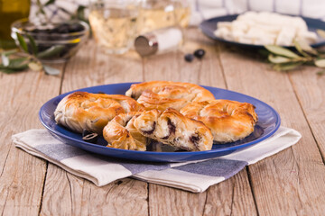 Pastry swirls with cheese and olive filling.
