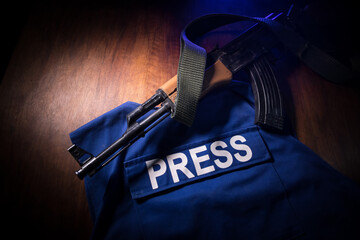 Media Journalism Global Daily News Content Concept. Blue journalist (press) vest in dark with...