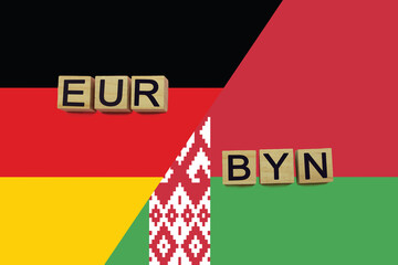 Fototapeta premium Germany and Belarus currencies codes on national flags background