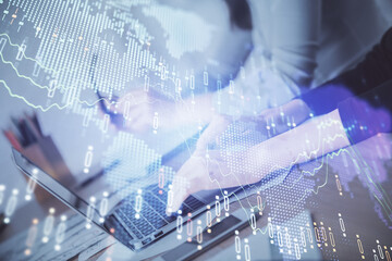 Multi exposure of woman hands typing on computer and financial chart hologram drawing. Stock market analysis concept.