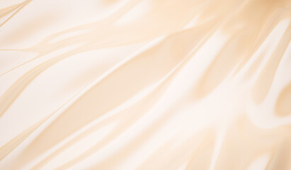 Smooth elegant golden silk wedding background closeup of rippled cream silk fabric lines