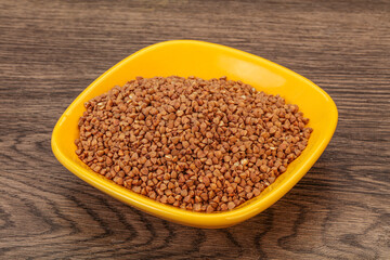 Raw buсkwheat cereal in the bowl
