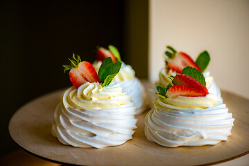 Meringue cake with cream and strawberries