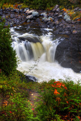 Fototapeta na wymiar Vertical of Batchawana Falls in Ontario, Canada