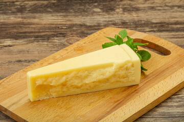 Hard parmesan cheese served basil