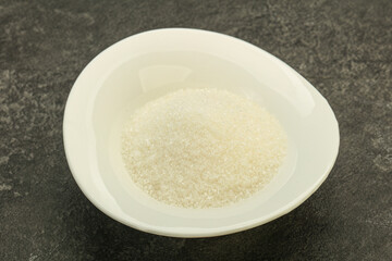 White sugar in the bowl