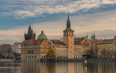 Naklejka na ściany i meble Prague from island on river Vltava near old bridges and towers