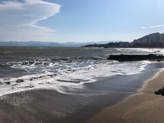 The color of the sea water has become the color of mud with the black sea region, seaside, harsh sea and rain. Seaside settlement.