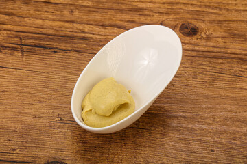 Dijon mustard sauce in the bowl