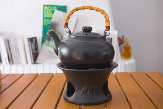 Professional clay kettle used with a alcohol burner. Beautiful object used for Gong Fu Cha brewing in Asia (China, Taiwan...). 