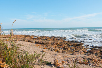 Beautiful natural seascape. Rocks, water, blue sky. Paradise scenery. Perfect desktop background.