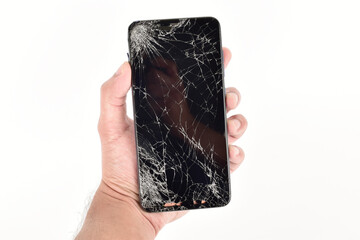 cracked screen smartphone in hand, broken smartphone