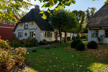 Nieblum, Germany - October 16, 2020: Thatched houses in Föhr during autumn