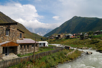 Fototapeta na wymiar river bend in mountain village 