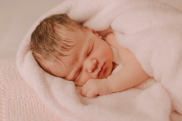 baby - mother with her red-haired daughter
