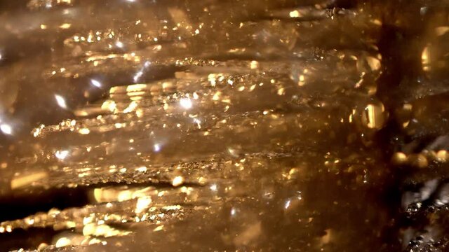 Golden blurry background with glitter - videoclip