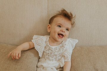 baby - mother with her red-haired daughter
