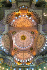 Fototapeta premium Inner dome and ceiling painting of Yeni Mosque (New Mosque) in Istanbul, Turkey
