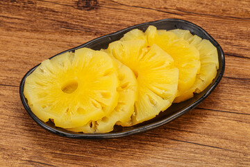 Marinated pineapple rings in the bowl