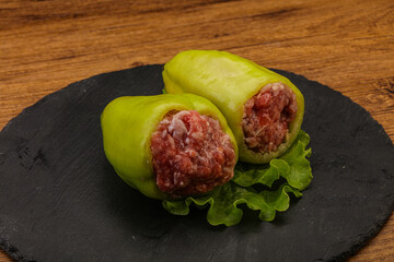 Raw stuffed pepper for cooking