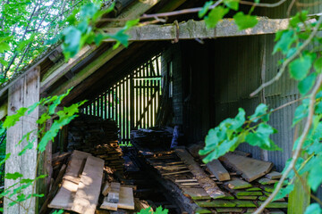 old building interior with wooden planks and brick wall