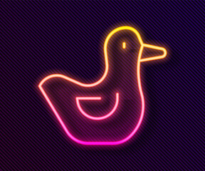 Glowing neon line Rubber duck icon isolated on black background. Vector.