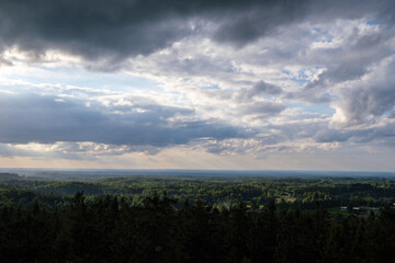 dramatatic red dark sunset over the fields and cities