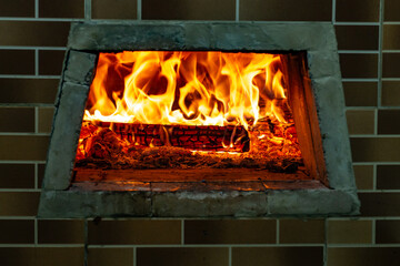 Refractory brick pizza oven to withstand high temperatures with firewood burning and being prepared for baking pizzas
