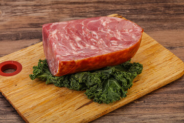 Beef ham piece over board