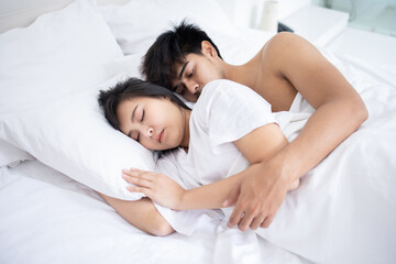 Obraz na płótnie Canvas Couple Asian man and woman on bed