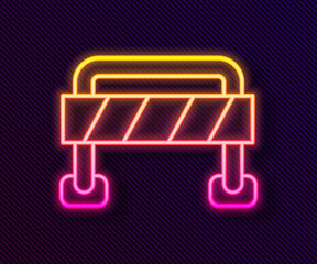 Glowing neon line Road barrier icon isolated on black background. Symbol of restricted area which are in under construction processes. Repair works. Vector.