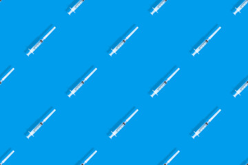 Seamless patterns. Medical syringes seamless pattern. Medical syringes background.