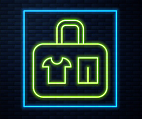 Glowing neon line Suitcase for travel icon isolated on brick wall background. Traveling baggage sign. Travel luggage icon. Vector.