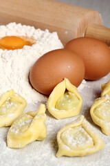 Making tortellini stuffed with spinach and ricotta