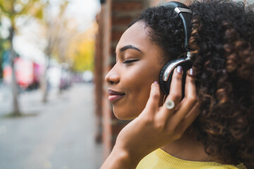 Afro american woman listening music