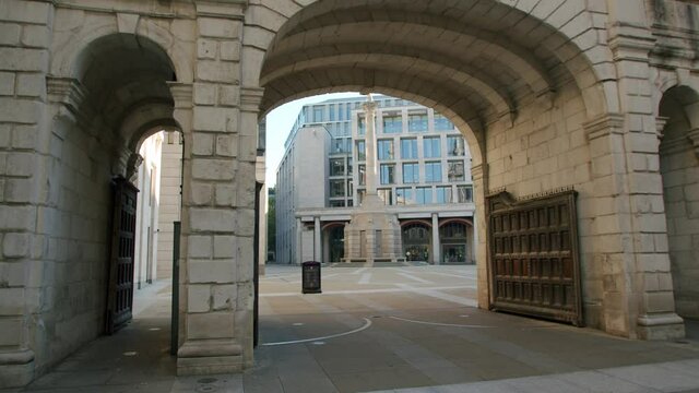 Lockdown in London, completely empty Paternoster Square through archway in beautiful morning sunrise light, during the COVID-19 pandemic 2020.