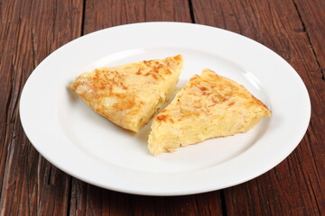Piece of Spanish omelette on plate