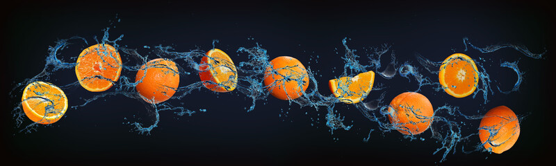 Panorama with fruits in water - juicy oranges are full of vitamins and minerals