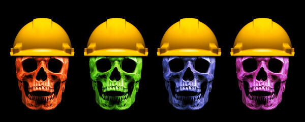 Different color human skulls on a black background in a yellow construction helmets. Deadly accident concept.